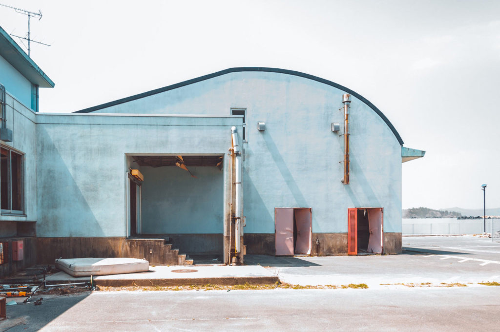 Entrance of the blue building of Abandoned Ukedo Elementary School in Namie, Fukushima